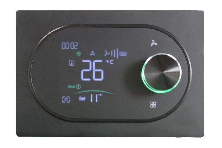 View of the thermostat mounted on the wall, with control dial and digital display